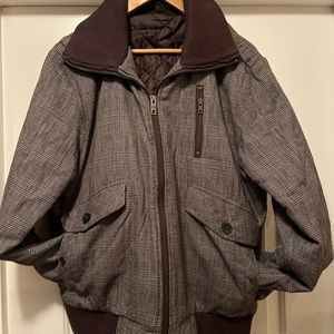 Plaid quilted jacket. Excellent used condition. Smoke free/ pet free home.